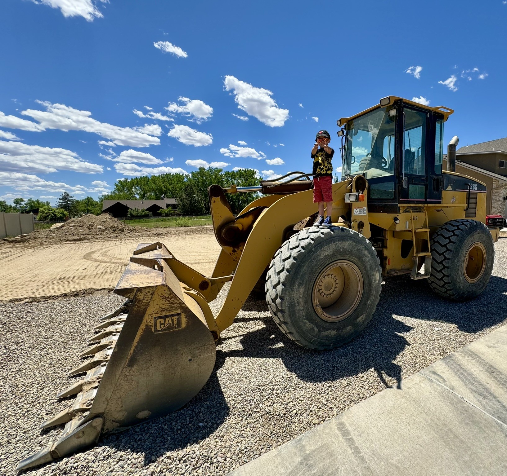 smiling african american woman near model building table with equipments